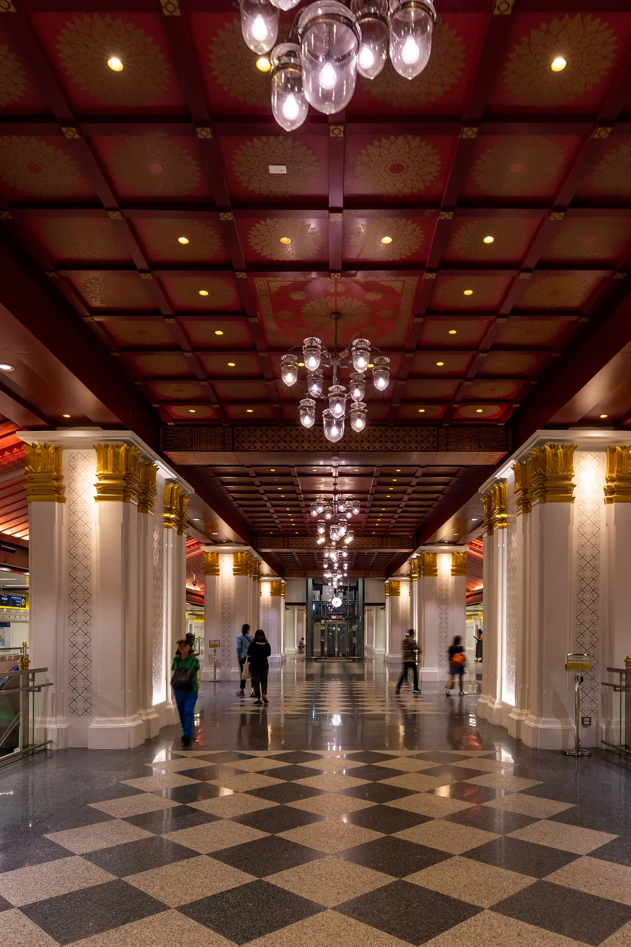 Red and gold interior of Sanam Chai metro station